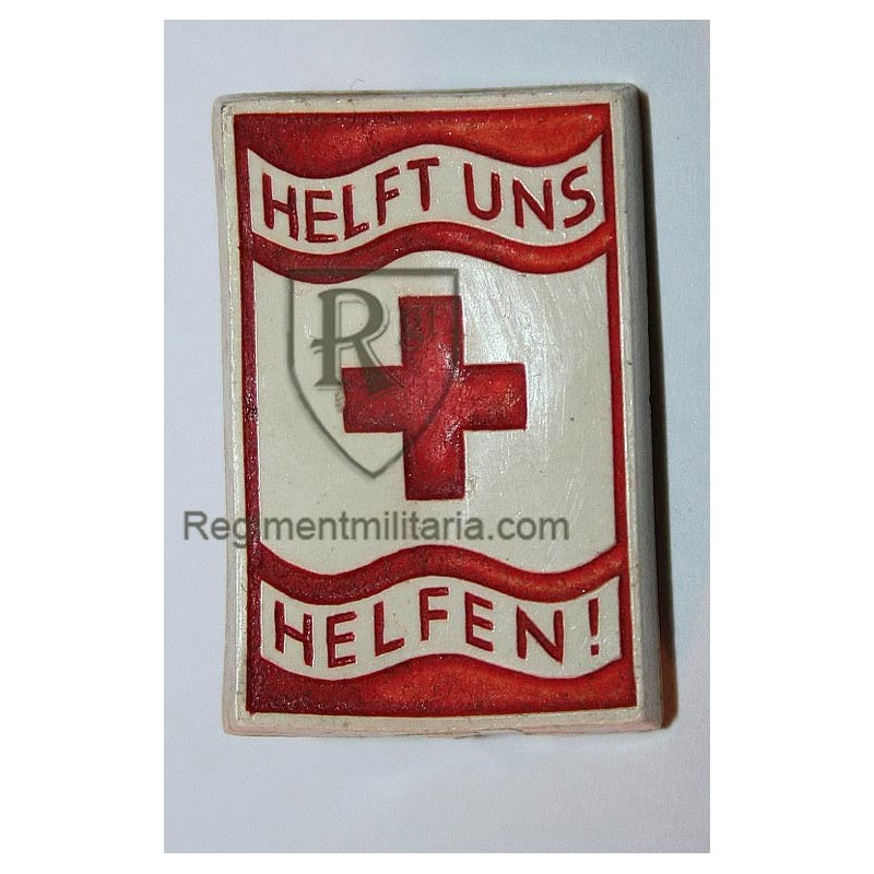 Red cross badge.