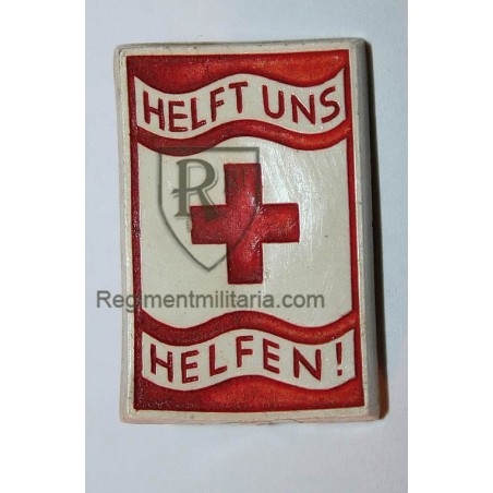 Red cross badge.